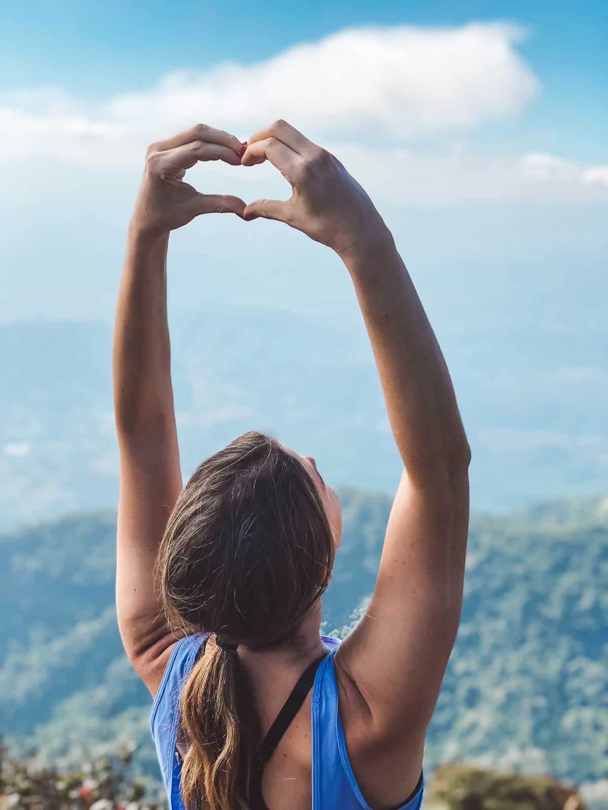 A moment of mindfulness and gratitude on top of a mountain in Chiang Mai, Thailand 