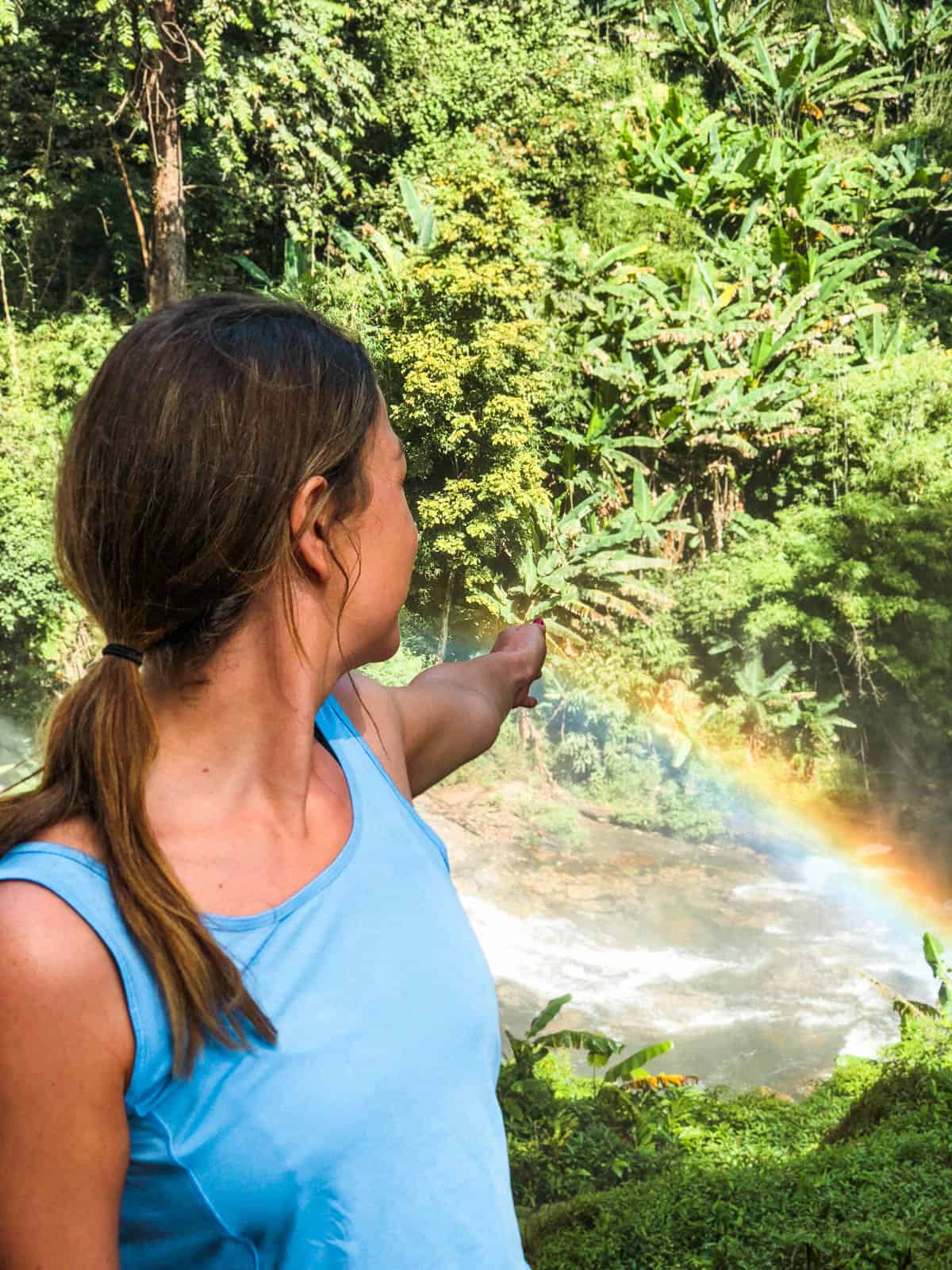 Looking at a rainbow over a waterfall in Doi Inthanon national park in Chiang Mai