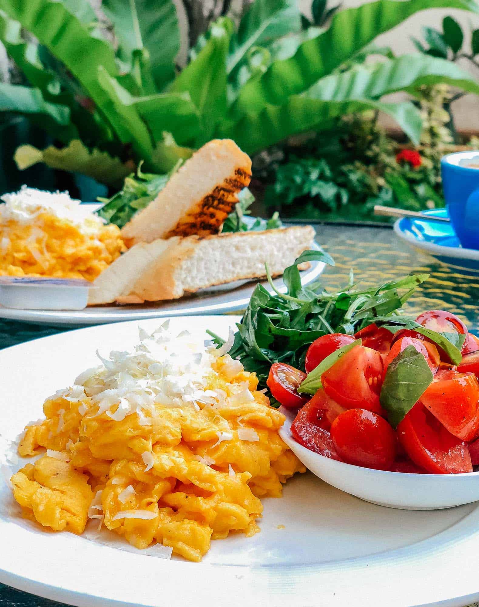 Scrambled eggs, toast and tomato salad brunch at Larder Cafe in Chiang Mai