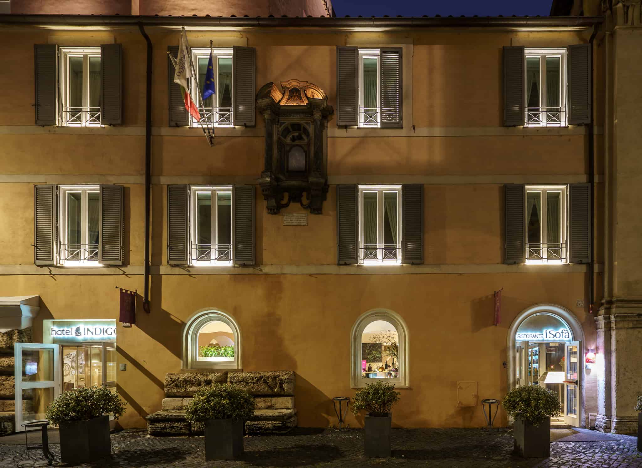 Exterior view of hotel indigo in rome at night during a 4 day rome itinerary