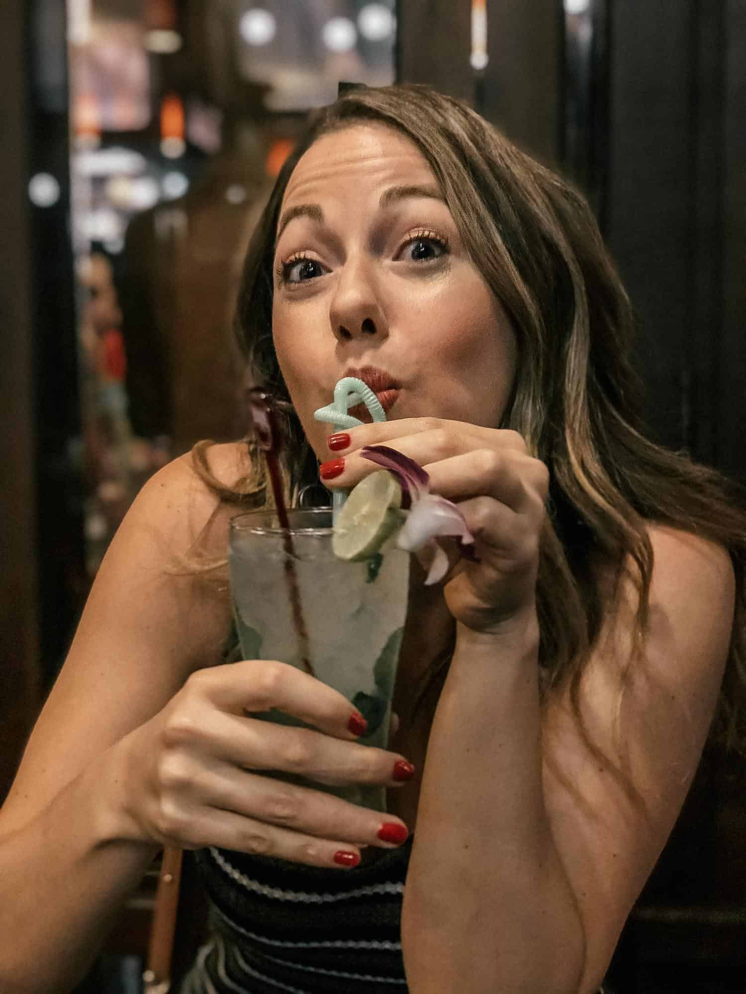 Sipping cocktails from a straw at a restaurant in Nimman district of Chiang Mai during a 4-day visit