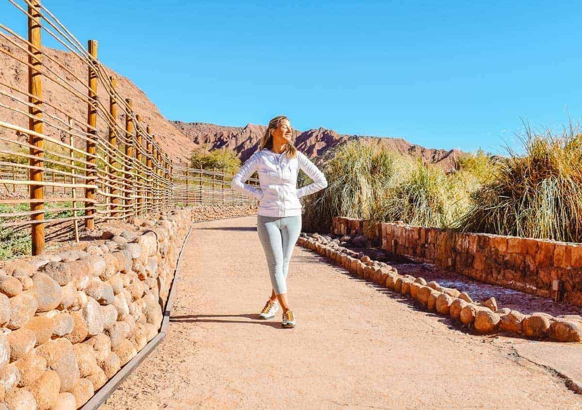 Woman standing outside in the desert at the Alto Atacama hotel in Chile