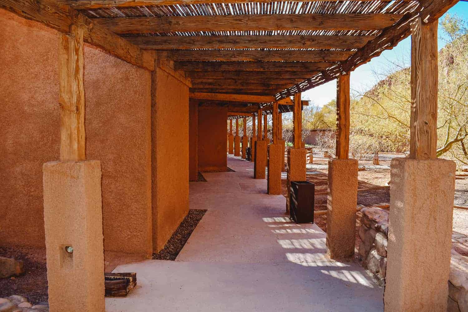 Outdoor hallway leading to guest rooms at Alto Atacama Hotel in Northern Chile