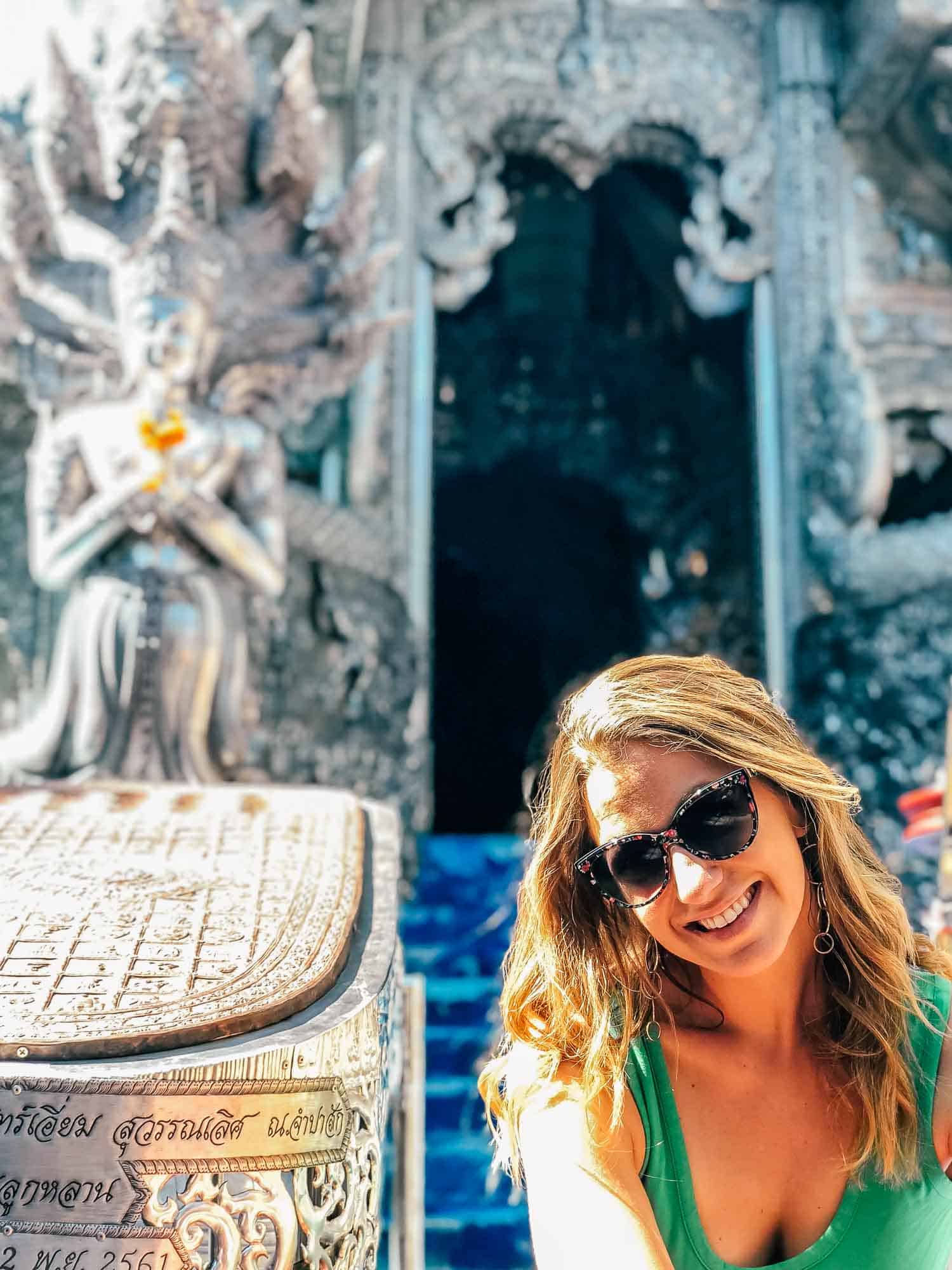 Sitting outside the Silver Temple in the Old City of Chiang Mai