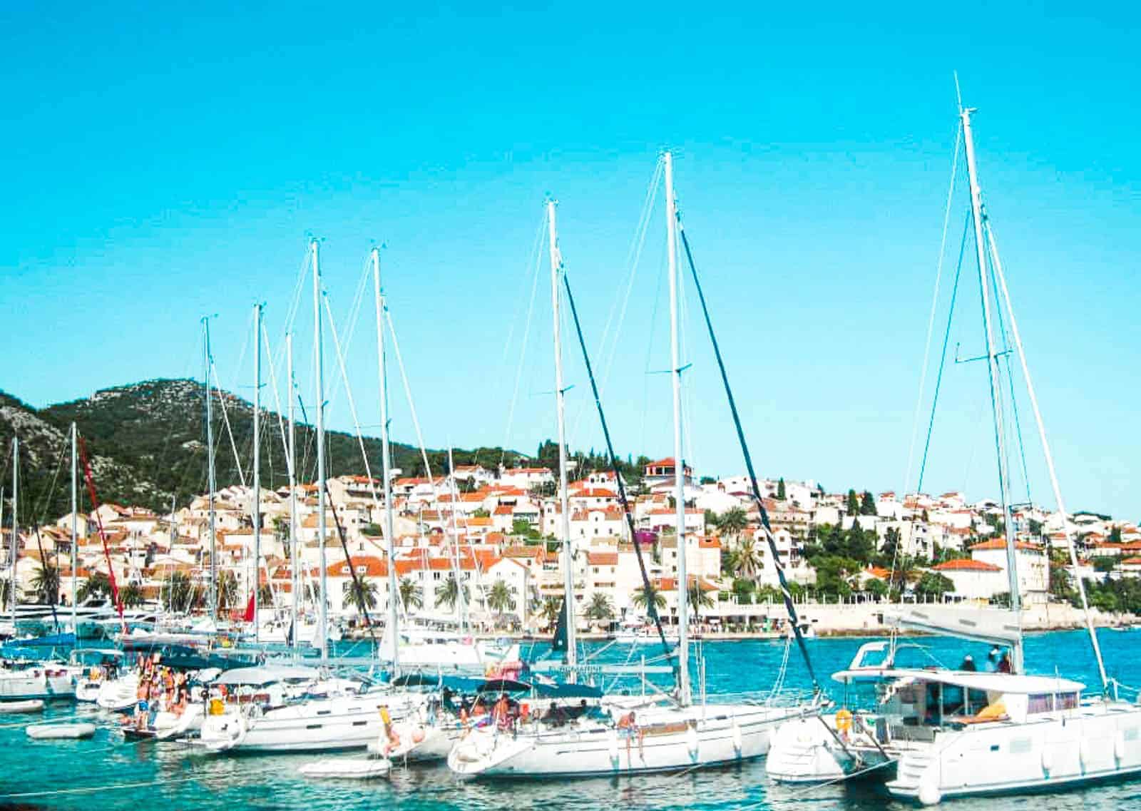 Row of boats docked off the coast of Split in the Croatian Islands