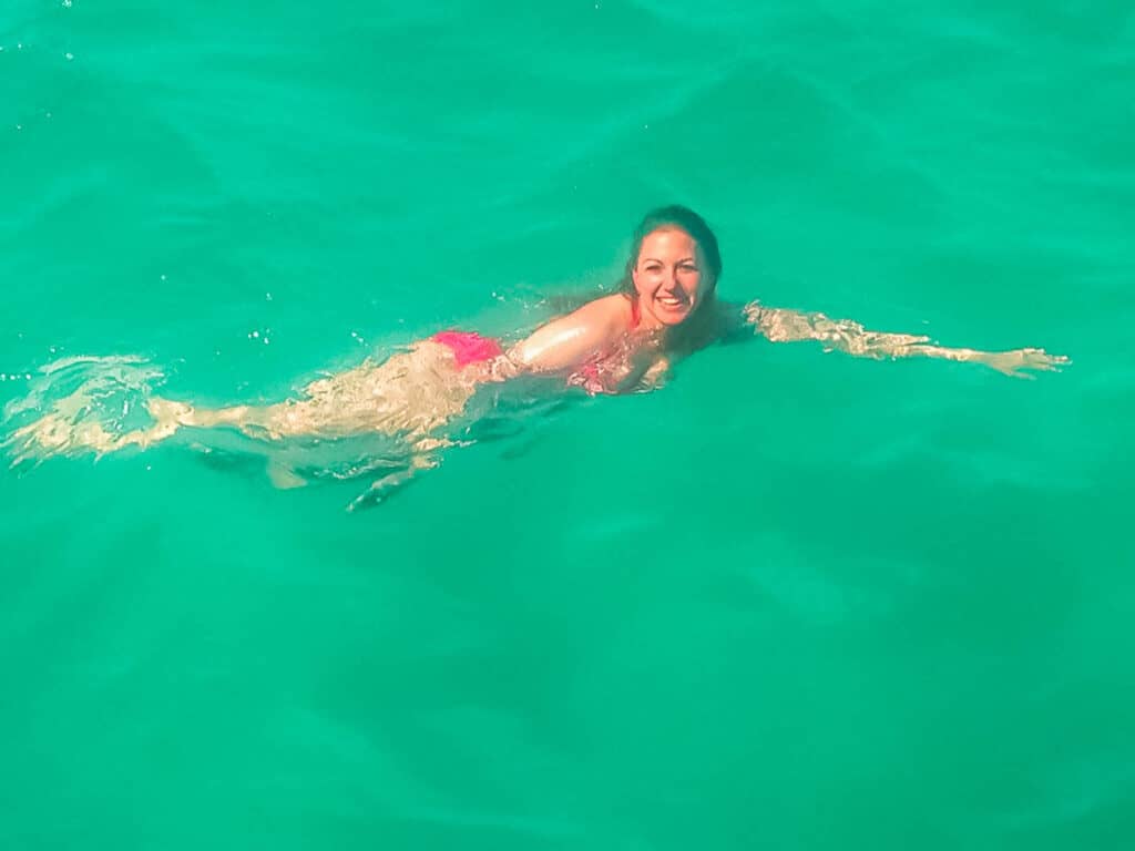 Woman swimming in the Adriatic sea off the coast of Croatia